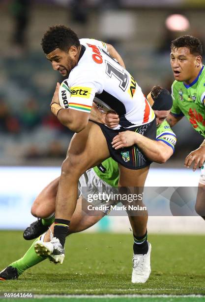 Viliame Kikau of the Panthers runs the ball during the round 14 NRL match between the Canberra Raiders and the Penrith Panthers at GIO Stadium on...