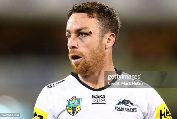 James Maloney of the Panthers watches on during the round 14 NRL match between the Canberra Raiders and the Penrith Panthers at GIO Stadium on June...