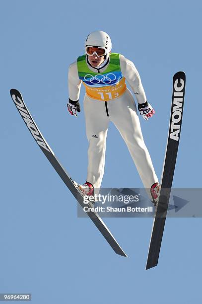 Martin Schmitt of Germany competes in the men's ski jumping team event on day 11 of the 2010 Vancouver Winter Olympics at Whistler Olympic Park Ski...