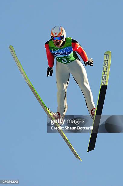 Taku Takeuchi of Japan competes in the men's ski jumping team event on day 11 of the 2010 Vancouver Winter Olympics at Whistler Olympic Park Ski...