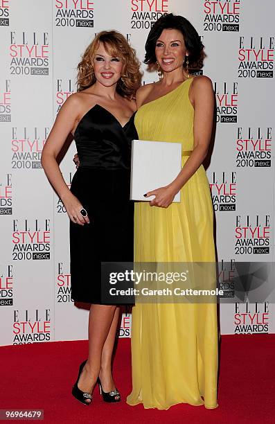 Kylie Minogue poses with sister Dannii Minogue and her TV Star award at the The ELLE Style Awards 2010 at the Grand Connaught Rooms on February 22,...