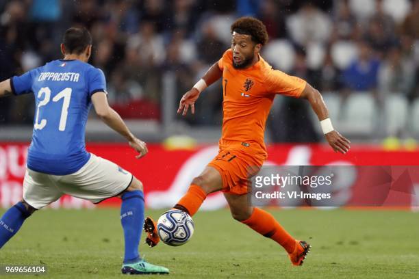 Davide Zappacosta of Italy, Tonny Vilhena of Holland during the International friendly match between Italy and The Netherlands at Allianz Stadium on...