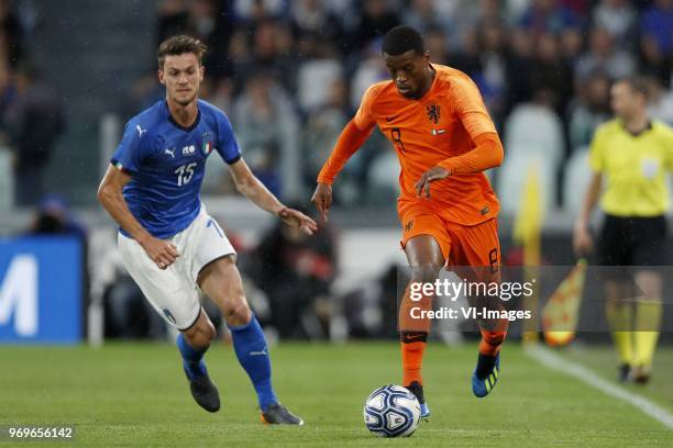 Daniele Rugani of Italy, Georginio Wijnaldum of Holland during the International friendly match between Italy and The Netherlands at Allianz Stadium...