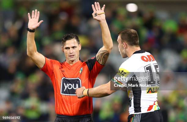Referee Henry Perenara sends Kaide Ellis of the Panthers to the sin bin during the round 14 NRL match between the Canberra Raiders and the Penrith...