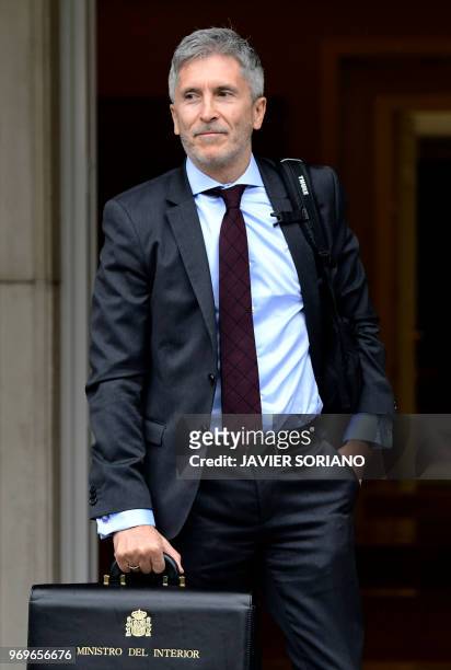 Spanish interior minister Fernando Grande-Marlaska poses as he arrives prior to holding the new government's first cabinet meeting at La Moncloa...