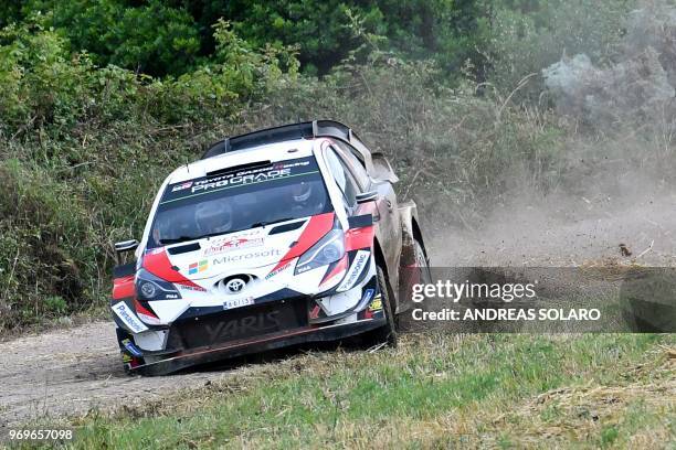 Estonian driver Ott Tanak steers his Toyota Yaris WRC with his co-driver Martin Jarveoja, near Castelsardo village, on the second day of the 2018 FIA...