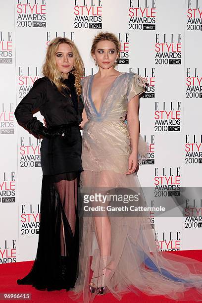 Ashley Olsen and Mary-Kate Olsen pose at the The ELLE Style Awards 2010 at the Grand Connaught Rooms on February 22, 2010 in London, England.