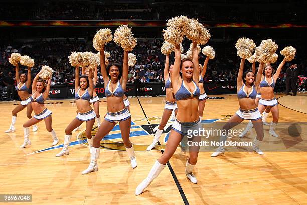 The Wizard Girls dance team strike a pose during a time out of the Washington Wizards game against the Chicago Bulls at the Verizon Center on...