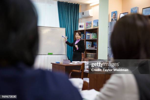 City librarians take a class on the new alphabet at the National Library in Astana, Kazakhstan. Kazakhstan is changing its alphabet from Cyrillic...