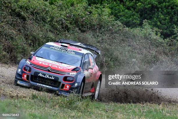 Ireland's Craig Breen and co-driver Britain's Scott Martin steer their Citroen C3 WRC, near Castelsardo village, on the second day of the 2018 FIA...