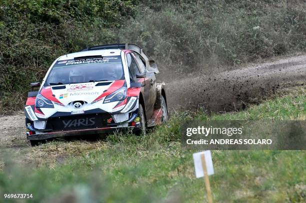 Finnish driver Jari-Matti Latvala and compatriot co-driver Miikka Anttila drive their Toyota Yaris WRC, near Castelsardo village, on the second day...