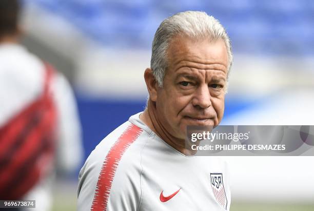 Head coach Dave Sarachan looks on during a training session of the US national football team, on June 8 at the Groupama Stadium in Decines-Charpieu...