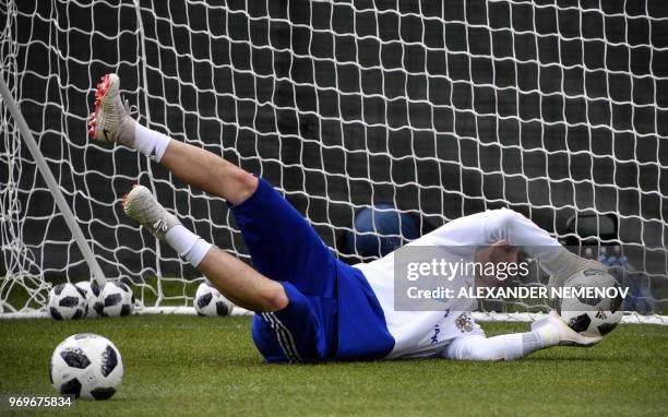 Russia's goalkeeper Andrey Lunyov attends a training session of the Russian national football team in Novogorsk outside Moscow on June 8 ahead of the...