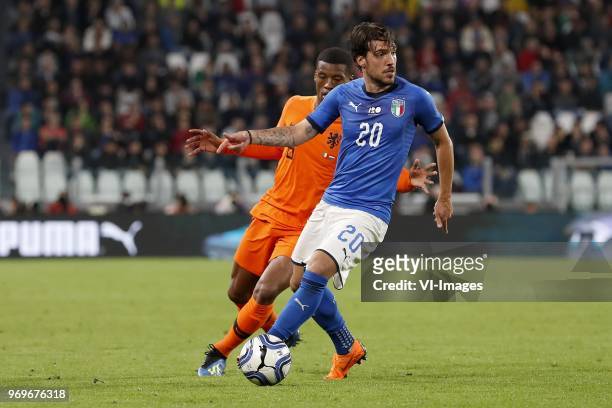 Georginio Wijnaldum of Holland, Simone Verdi of Italy during the International friendly match between Italy and The Netherlands at Allianz Stadium on...