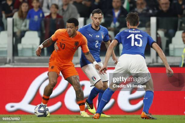 Memphis Depay of Holland, Mattia De Sciglio of Italy, Daniele Rugani of Italy during the International friendly match between Italy and The...