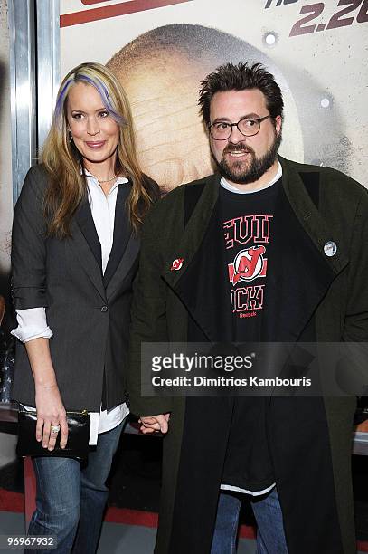 Director Kevin Smith and wife Jennifer Schwalbach attend the premiere of "Cop Out" at AMC Loews Lincoln Square 13 on February 22, 2010 in New York...