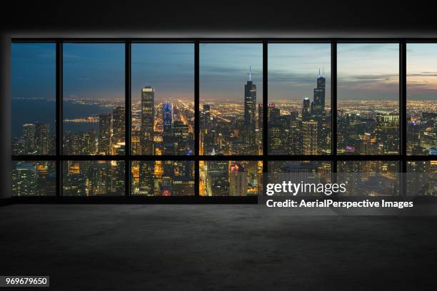 skyscraper outside the windows at night / chicago, illinois - chicago skyscraper stock pictures, royalty-free photos & images