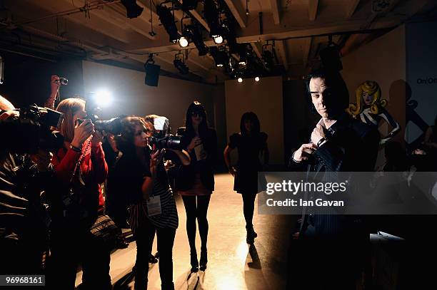 Nick Cave attends the Pam Hogg show during London Fashion Week Autumn/Winter 2010 at On|Off at Senate House on February 22, 2010 in London, England.