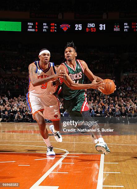 Jerry Stackhouse of the Milwaukee Bucks drives against Jonathan Bender of the New York Knicks on February 22, 2010 at Madison Square Garden in New...