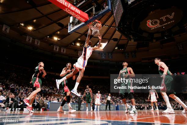 Jonathan Bender of the New York Knicks shoots against Jerry Stackhouse of the Milwaukee Bucks on February 22, 2010 at Madison Square Garden in New...