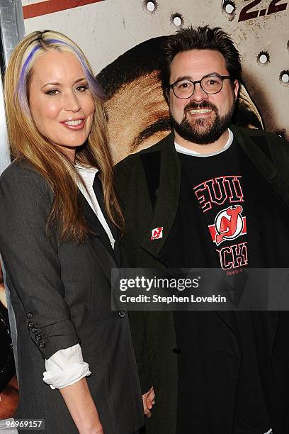 Director Kevin Smith and wife Jennifer Schwalbach attend the premiere of "Cop Out" at AMC Loews Lincoln Square 13 on February 22, 2010 in New York...
