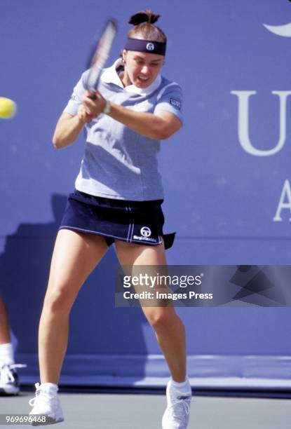 Martina Hingis plays tennis during the 1998 US Open in New York City.