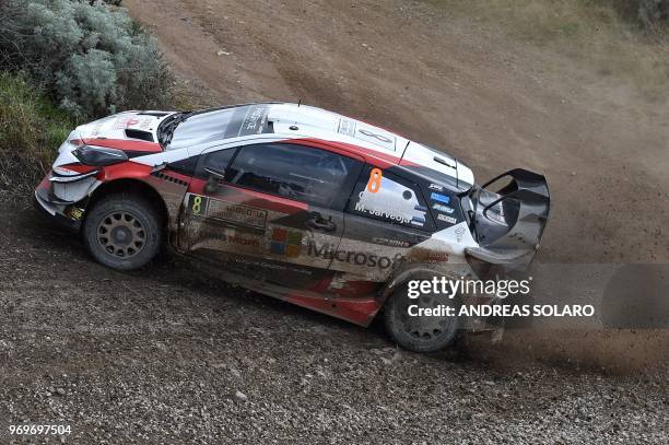 Estonia's driver Ott Tanak steers his Toyota Yaris WRC with his co-driver Martin Jarveoja, near Castelsardo village, on the second day of the 2018...