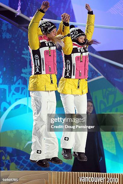 Claudia Nystad and Evi Sachenbacher-Stehle of Germany receive the gold medal during the medal ceremony for the women's team sprint cross-country...