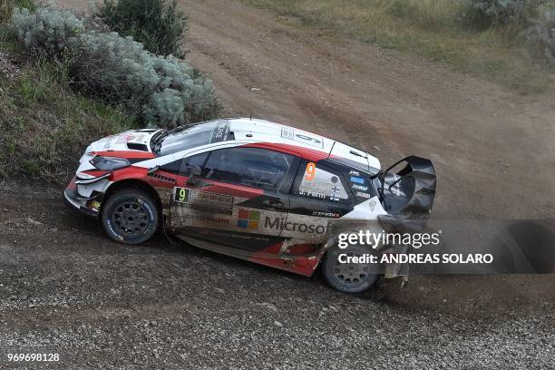 Finnish driver Esapekka Lappi and co-driver Janne Ferm steer their Toyota Yaris WRC, near Castelsardo village, on the second day of the 2018 FIA...