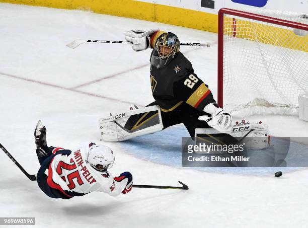 Devante Smith-Pelly of the Washington Capitals scores a third-period goal against Marc-Andre Fleury of the Vegas Golden Knights in Game Five of the...