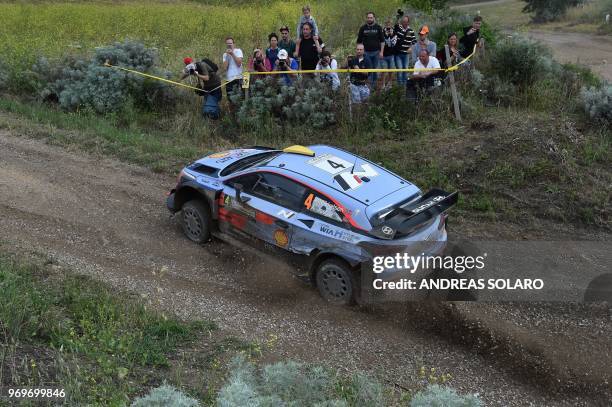 Norway's Andreas Mikkelsen and co-driver Anders Jaeger Synnevaag steer their Hyundai i20 Coupe WRC, near Castelsardo village, on the second day of...