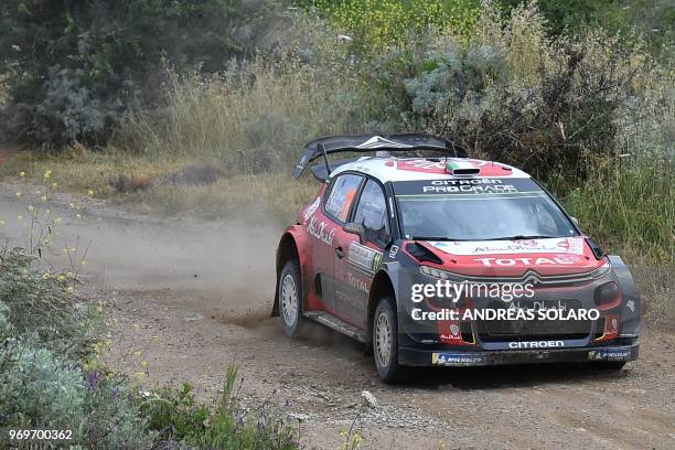 Ireland's Craig Breen and co-driver Britain's Scott Martin steer their Citroen C3 WRC, near Castelsardo village, on the second day of the 2018 FIA...