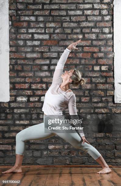 Yoga teacher and Wales and Ospreys Rugby Union player Alecs Donovan pictured demonstrating a Peaceful Warrior/ Shanti Virabhadrasana during a Yoga...