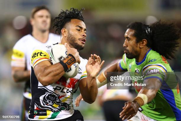 Christian Crichton of the Panthers runs the ball during the round 14 NRL match between the Canberra Raiders and the Penrith Panthers at GIO Stadium...