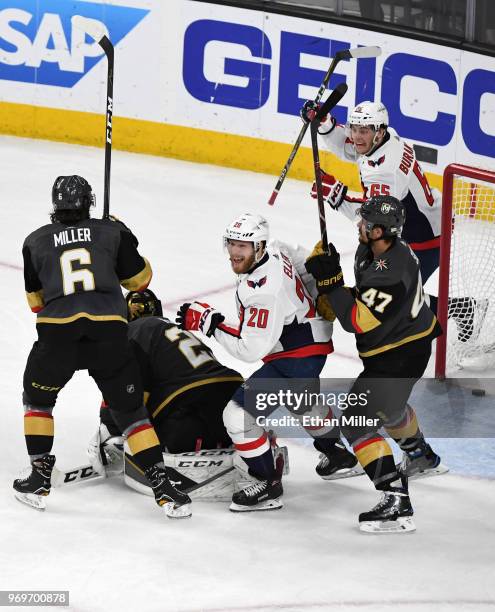 Lars Eller and Andre Burakovsky of the Washington Capitals celebrate after Burakovsky assisted Eller on a third-period goal against the Vegas Golden...