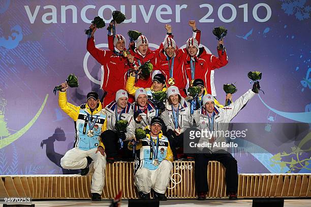 The German team receive the silver medal, the Austrian team receive the gold medal and the Norwegian team receive the bronze medal during the medal...