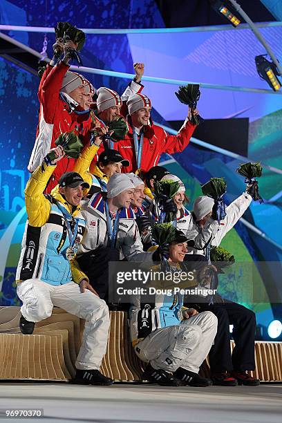 The German team receive the silver medal, the Austrian team receive the gold medal and the Norwegian team receive the bronze medal during the medal...