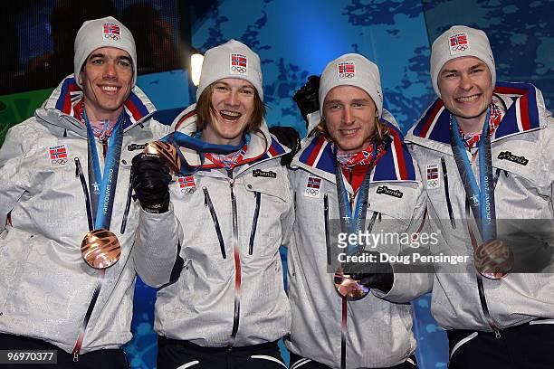 The Norwegian team receive the bronze medal during the medal ceremony for the men's team ski jumping on day 11 of the Vancouver 2010 Winter Olympics...