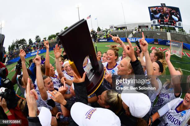 The James Madison Eagles celebrate their victory over the Boston College Eagles during the Division I Women's Lacrosse Championship held at Kenneth...