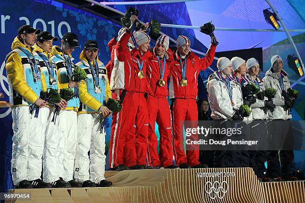 The German team receive the silver medal, the Austrian team receive the gold medal and the Norwegian team receive the bronze medal during the medal...