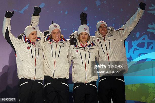 The Norwegian team receive the bronze medal during the medal ceremony for the men's team ski jumping on day 11 of the Vancouver 2010 Winter Olympics...