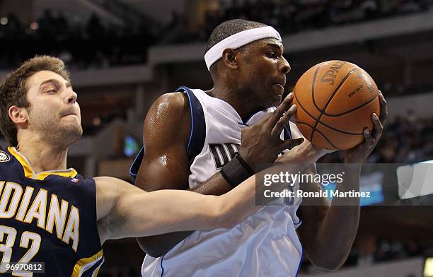 Center Brendan Haywood of the Dallas Mavericks takes a shot against Josh McRoberts of the Indiana Pacers on February 22, 2010 at American Airlines...