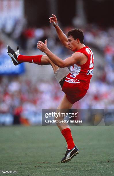 Leo Barry of the Swans kicks the ball during the round three AFL match between the Sydney Swans and the Geelong Cats at the SCG Sydney, Australia.