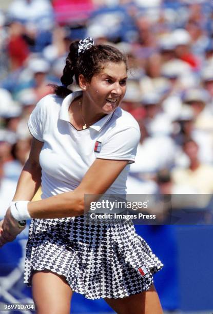 Monica Seles plays tennis during the 1995 US Open in New York City.