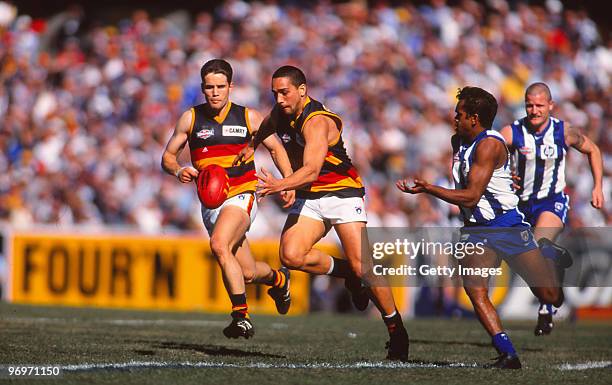 Andrew McLeod of the Crows chases the ball during the AFL Grand Final match between North Melbourne and the Adelaide Crows at the MCG in Melbourne,...