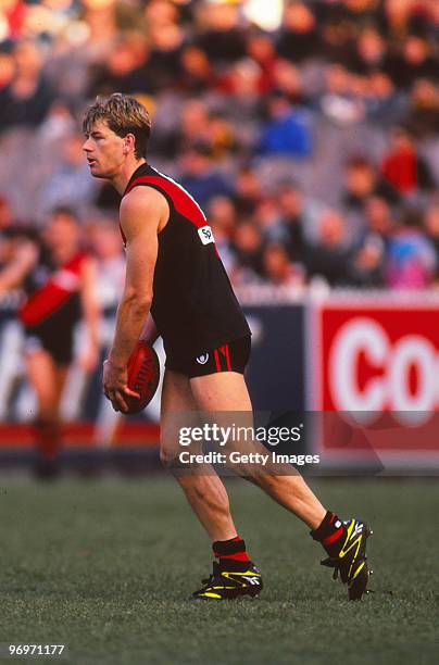 Mark Harvey of the Bombers prepares to kick during the round 11 AFL match between Hawthorn and Essendon in Melbourne, Australia.