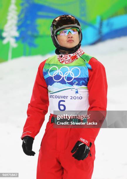 Liu Zhongqing of China looks on during the freestyle skiing men's aerials qualification on day 11 of the Vancouver 2010 Winter Olympics at Cypress...