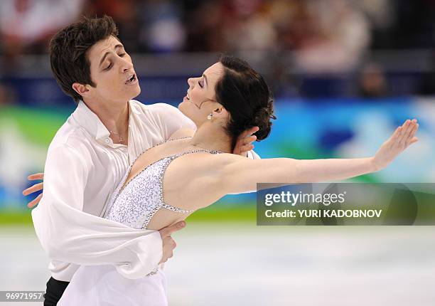 Gold medallists, Canada's Tessa Virtue and Scott Moir, perform in the Ice Dance Free program at the Pacific Coliseum in Vancouver, during the 2010...