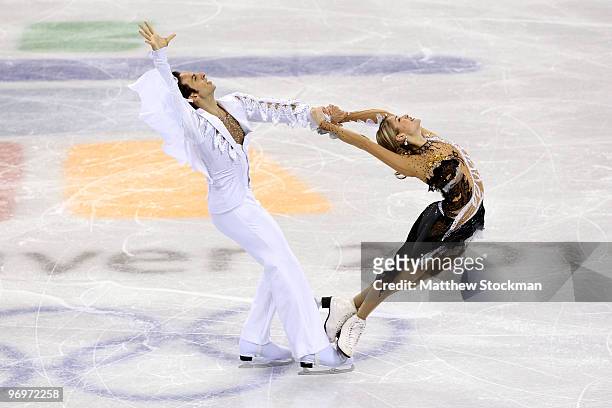 Tanith Belbin and Benjamin Agosto of USA compete in the free dance portion of the Ice Dance competition on day 11 of the 2010 Vancouver Winter...
