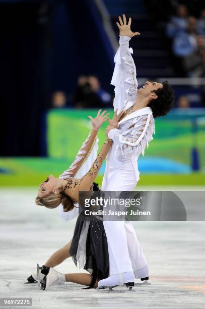Tanith Belbin and Benjamin Agosto of USA compete in the free dance portion of the Ice Dance competition on day 11 of the 2010 Vancouver Winter...